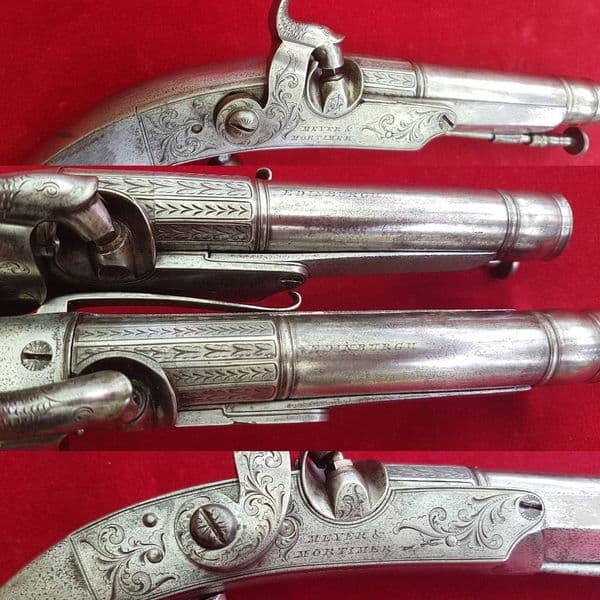 A rare Pair of Scottish  Highlanders  Ram's horn all steel belt pistols by MEYER & MORTIMER Ref 1509